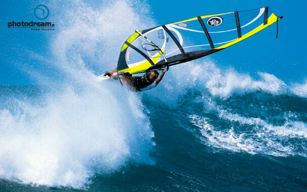 Cesare Cantagalli - Capo Mannu - Sardinia Shooting wave for Drops and Challeger Shoot from the water side view of the spo